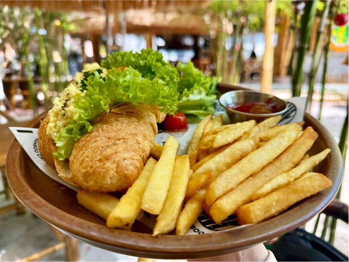 Croissant sandwich with fries